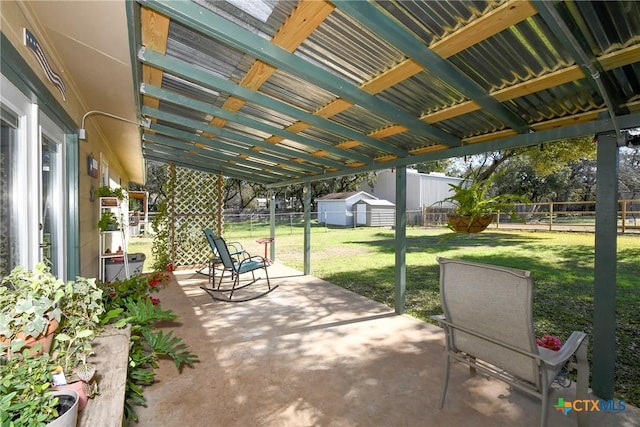 view of patio / terrace with a storage unit