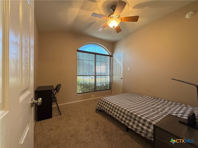 carpeted bedroom with ceiling fan and lofted ceiling