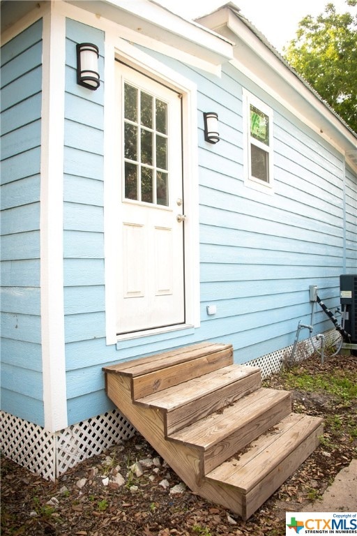 entrance to property with cooling unit