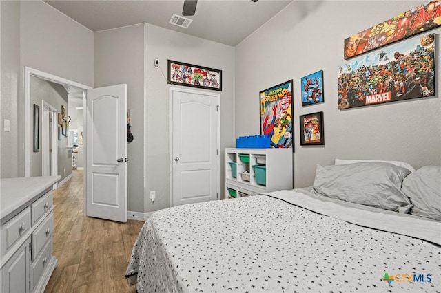 900 Holliday Dr, Killeen, TX 76542 - bedroom featuring wood finished floors, baseboards, and a ceiling fan