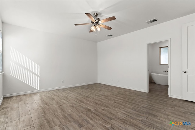 empty room featuring ceiling fan