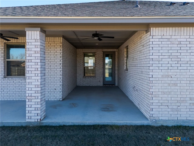 property entrance featuring ceiling fan and a patio area