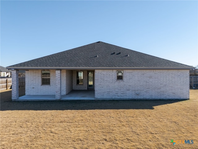 rear view of property with a patio area