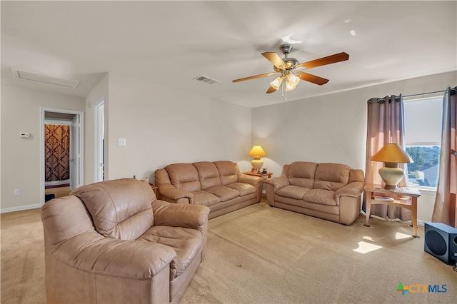 carpeted living room featuring ceiling fan