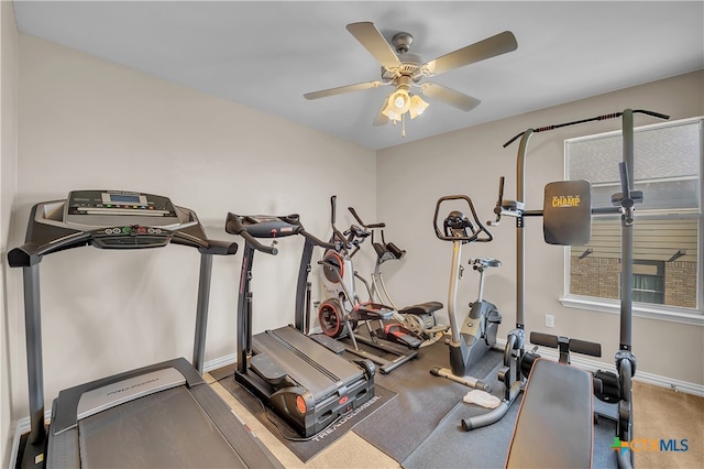 workout room featuring ceiling fan