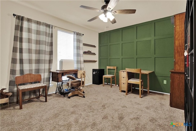 interior space with light carpet and ceiling fan