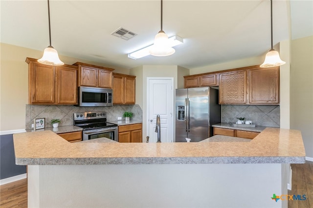 1126 Neuberry Cliffe, Temple, TX 76502 - kitchen featuring stainless steel appliances, baseboards, and light wood finished floors