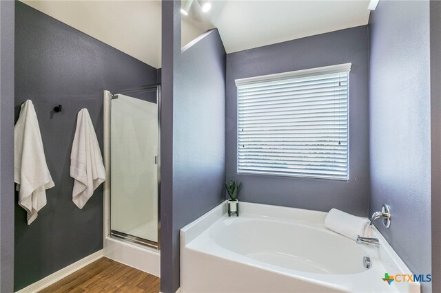 1126 Neuberry Cliffe, Temple, TX 76502 - full bath featuring a shower stall, a bath, and wood finished floors
