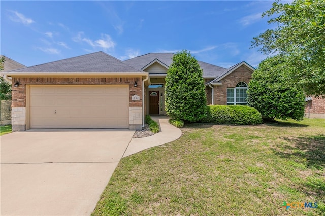 1126 Neuberry Cliffe, Temple, TX 76502 - ranch-style home featuring brick siding, concrete driveway, and an attached garage