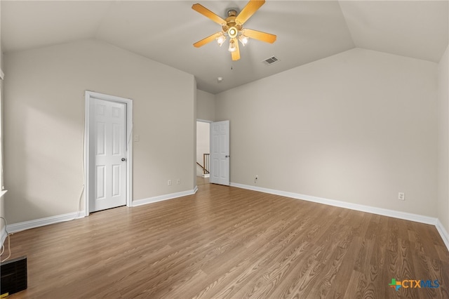 1018 Canyon Maple Rd, Pflugerville, TX 78660 - unfurnished bedroom featuring lofted ceiling, wood finished floors, baseboards, and ceiling fan