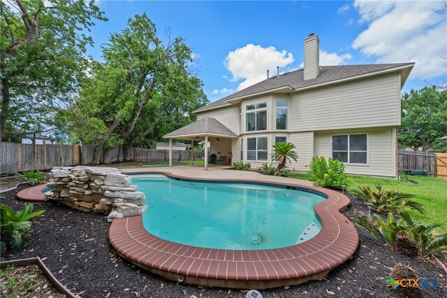 1018 Canyon Maple Rd, Pflugerville, TX 78660 - view of swimming pool featuring a patio area and a fenced backyard