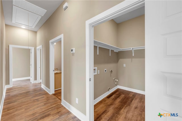 laundry room with hookup for a washing machine, gas dryer hookup, and dark hardwood / wood-style floors