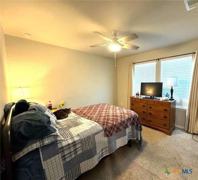 bedroom featuring carpet floors and ceiling fan