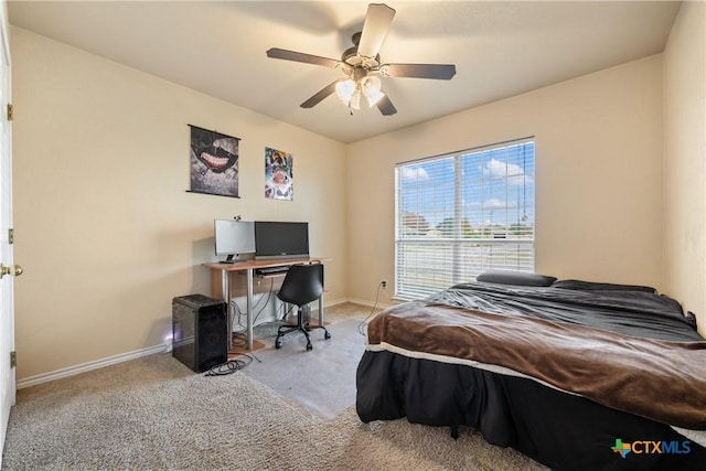 bedroom with ceiling fan and light carpet