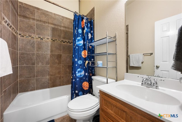 full bathroom with shower / bath combo, vanity, and toilet