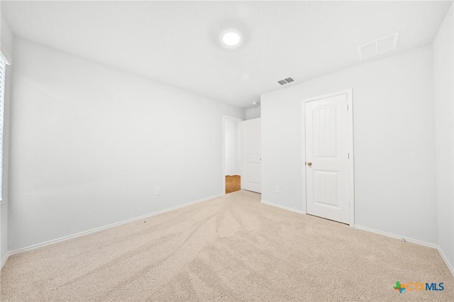 813 Indigo Way, Seguin, TX 78155 - unfurnished bedroom with carpet and baseboards