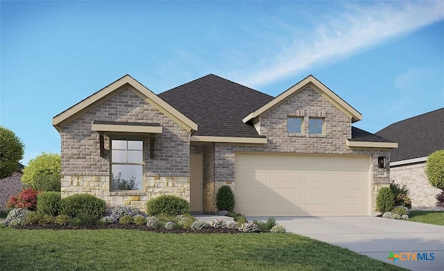 view of front of house featuring a front yard and a garage