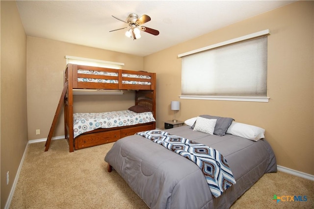 461 Naked Indian Trl, New Braunfels, TX 78132 - carpeted bedroom featuring baseboards and ceiling fan