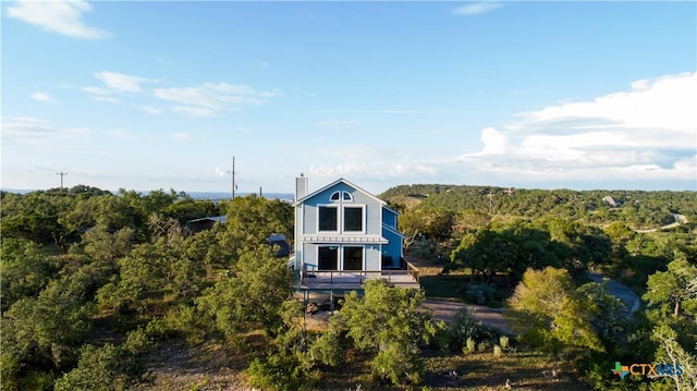 461 Naked Indian Trl, New Braunfels, TX 78132 - aerial view of property and surrounding area featuring a forest