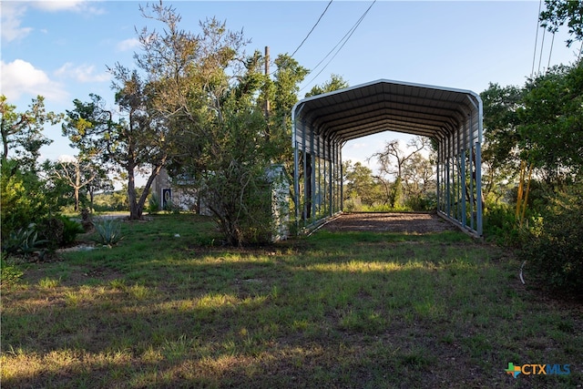 view of yard with a carport