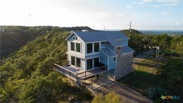 exterior space featuring a wooden deck