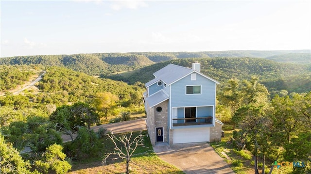 461 Naked Indian Trl, New Braunfels, TX 78132 - view from above of property with a forest