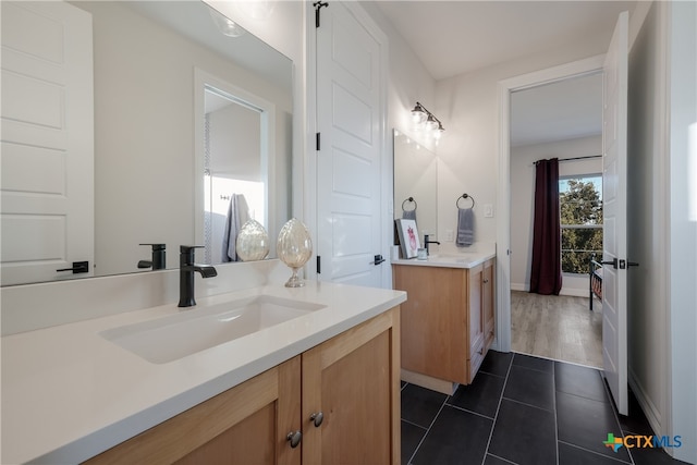 bathroom featuring vanity and hardwood / wood-style floors