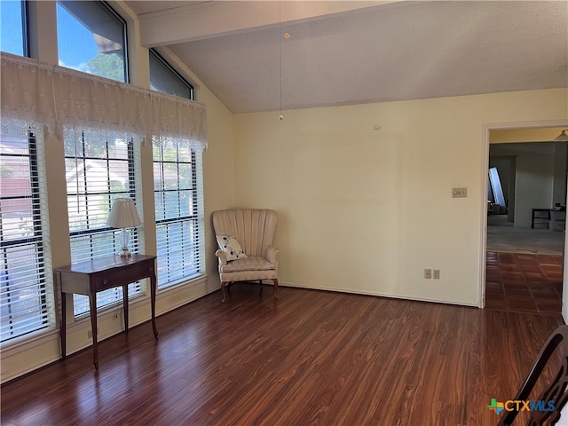 unfurnished room with high vaulted ceiling, dark wood-type flooring, and beamed ceiling