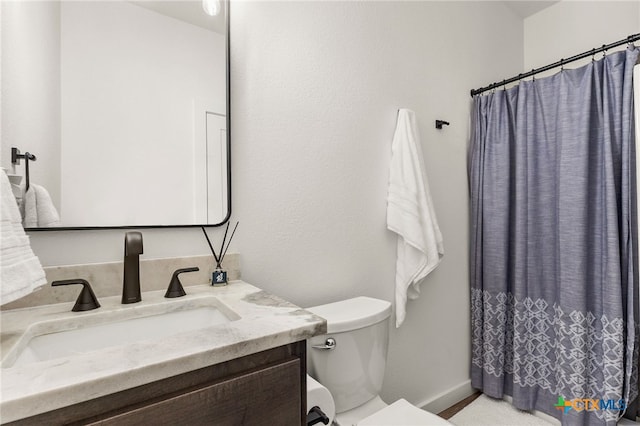 29720 Twin Creeks Dr, Bulverde, TX 78163 - full bathroom with toilet, vanity, a shower with shower curtain, and baseboards