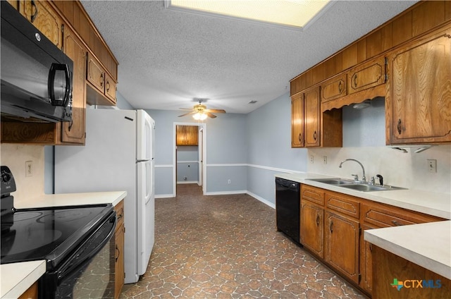1606 Cedar Oaks Ln, Harker Heights, TX 76548 - kitchen featuring black appliances, light countertops, ceiling fan, brown cabinetry, and a textured ceiling