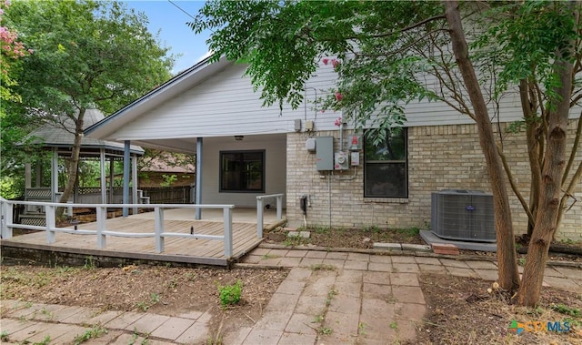 1606 Cedar Oaks Ln, Harker Heights, TX 76548 - rear view of house featuring a gazebo, a wooden deck, and a patio area