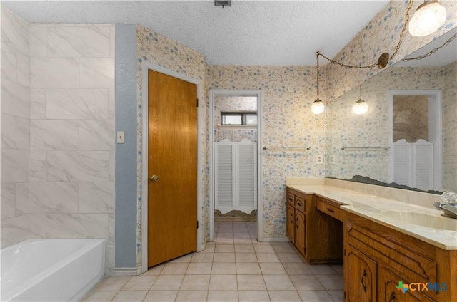 1606 Cedar Oaks Ln, Harker Heights, TX 76548 - bathroom featuring wallpapered walls, vanity, tile patterned floors, and a textured ceiling