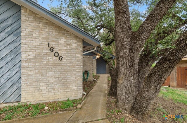 1606 Cedar Oaks Ln, Harker Heights, TX 76548 - view of side of home with brick siding