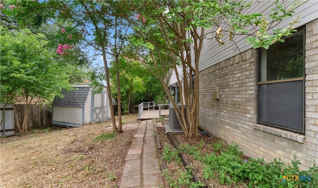 1606 Cedar Oaks Ln, Harker Heights, TX 76548 - view of yard with a shed and a wooden deck
