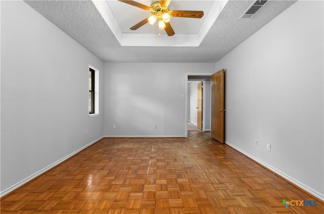 1606 Cedar Oaks Ln, Harker Heights, TX 76548 - spare room featuring a raised ceiling, a ceiling fan, and a textured ceiling