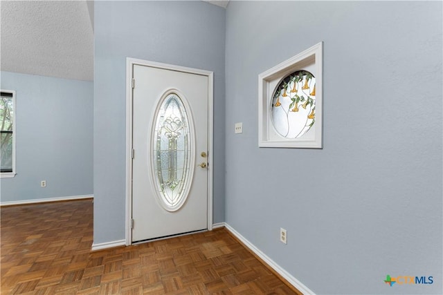 1606 Cedar Oaks Ln, Harker Heights, TX 76548 - foyer with a towering ceiling and a textured ceiling