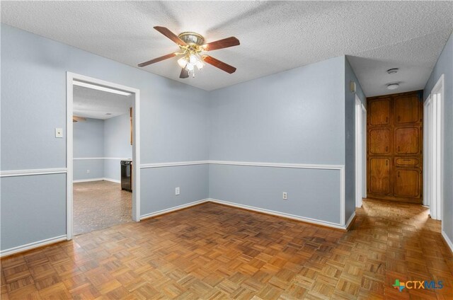 1606 Cedar Oaks Ln, Harker Heights, TX 76548 - unfurnished room with a ceiling fan and a textured ceiling