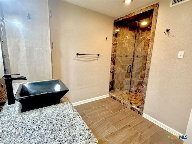1795 Falconwood Dr, San Marcos, TX 78666 - bathroom featuring a stall shower and vanity
