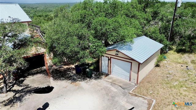1795 Falconwood Dr, San Marcos, TX 78666 - detached garage with a wooded view
