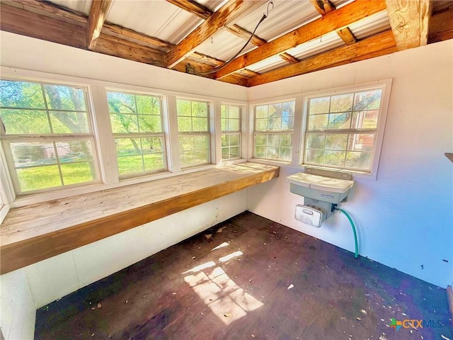 1795 Falconwood Dr, San Marcos, TX 78666 - unfurnished sunroom featuring beam ceiling
