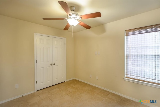 2102 Golden Eagle Dr, Killeen, TX 76549 - unfurnished bedroom with a closet and a ceiling fan