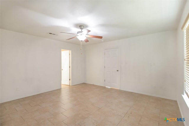 2102 Golden Eagle Dr, Killeen, TX 76549 - empty room with ceiling fan and healthy amount of natural light