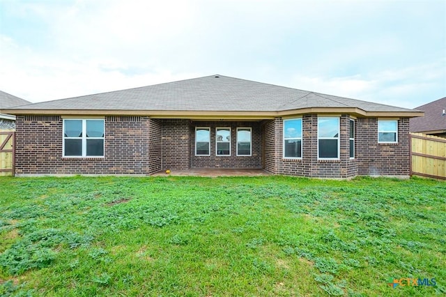 2102 Golden Eagle Dr, Killeen, TX 76549 - rear view of property featuring a patio and brick siding