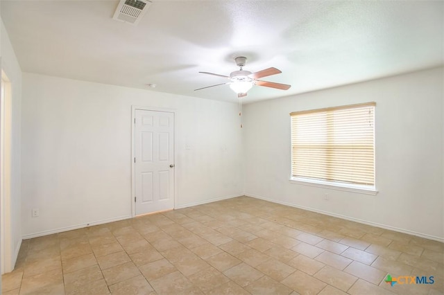 2102 Golden Eagle Dr, Killeen, TX 76549 - unfurnished room featuring a ceiling fan and baseboards