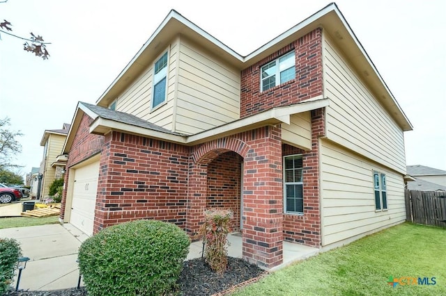 view of front of home featuring a garage