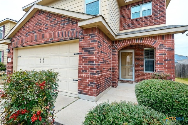 property entrance featuring a garage