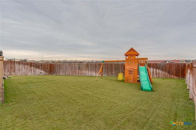 view of playground featuring a yard