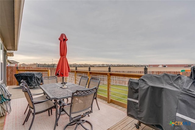 view of patio featuring a wooden deck and area for grilling