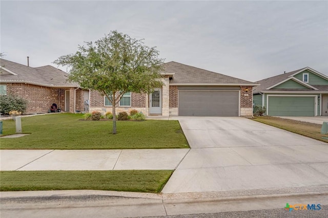 view of front facade with a garage and a front lawn