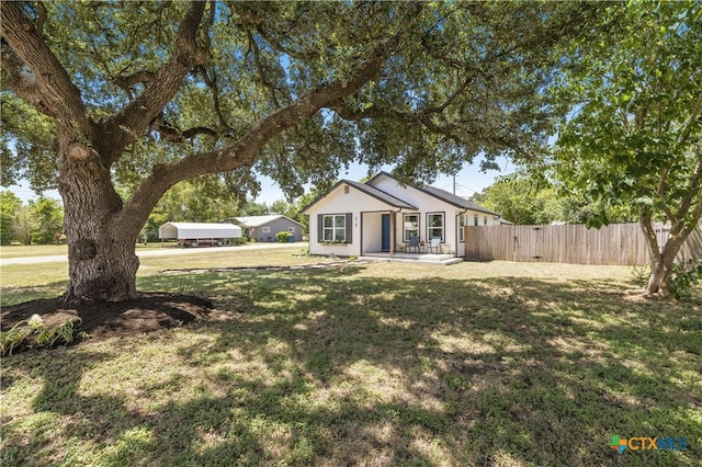 exterior space with a front lawn